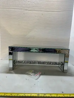 mirrored wall shelf with hardware and chip