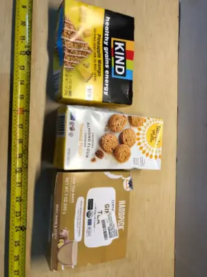 Kind pineapple mango bars 5 count exp:03/26/2026, almond flour cookies exp:02/25/2026, ginger tea 100 count exp:06/2027