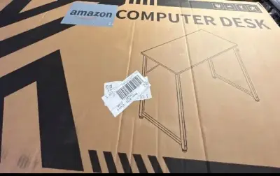 Computer desk has been opened as is