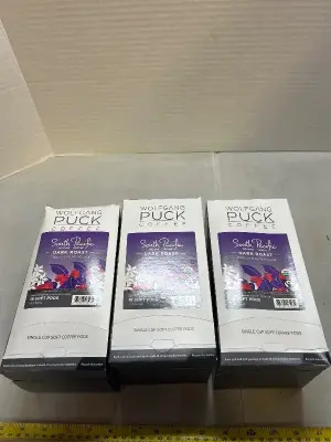 three boxes of 18 dark roast soft coffee pods