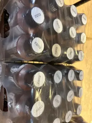 two 12 packs of core powder chocolate flavored 06/27/26