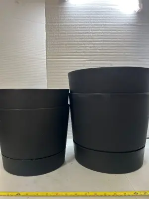 four count black flower pots two different sizes