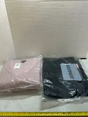 two size medium pink V-neck, sweaters wrangler shorts size 42