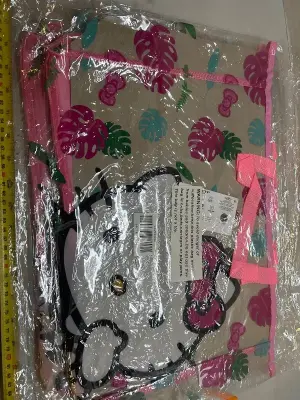 2 clear, hello Kitty tote bags