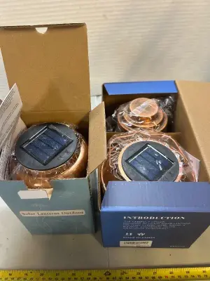 three outdoor solar lamps