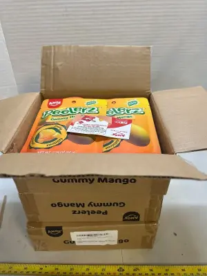 3 boxes of Amos mango gummy peeler candy
