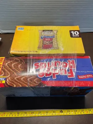 12 pack fudge rounds exp 01/26 , 10bags mini pretzels exp 02/26