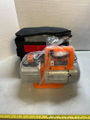 One stage vacuum pump with accessories and carrying tote