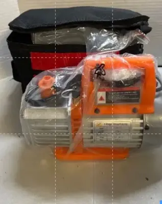 One stage vacuum pump with accessories and carrying tote