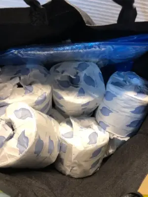 9 rolls toilet paper, blue shower curtain