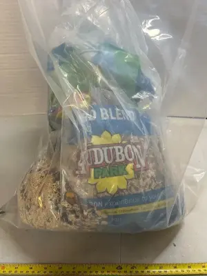 14 pounds of Songbird blend bird food busted bag