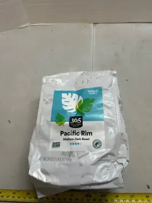 24 ounces of 365 home food market Pacific rim, medium dark roast ground coffee