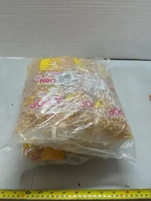 A lot of unpopped popcorn with butter