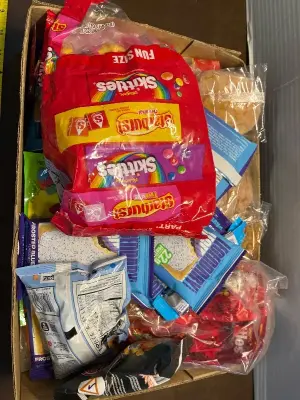 box of various candies/snacks