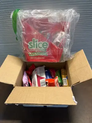box of various snacks & slice fruit on the go strawberry bars (mostly in date)