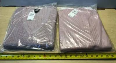 2 pink sweaters size medium