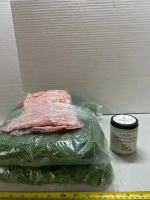 four count of wreath pickings and a Mother’s Day candle lavender scented