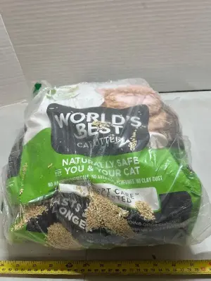 15 pounds of worlds, best cat litter, natural and safe, no clay cat litter busted bag