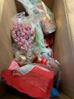 box of variety candy with various dates