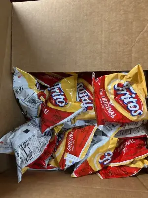 two boxes of assorted chips, mostly out of date