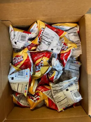 Big box of original Fritos (mostly in date)