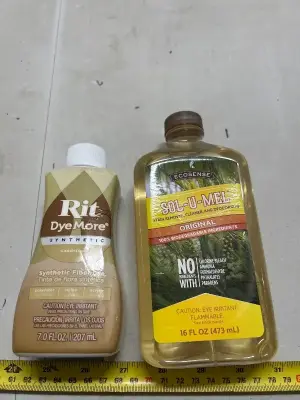 7 fluid ounces of synthetic fiber dye sandstone color, 16 fluid ounces of stain remover cleaner and deodorizer