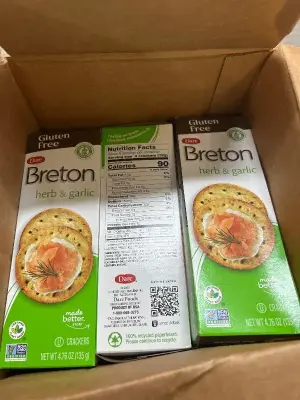 box of gluten-free herb and garlic crackers best before July 2025