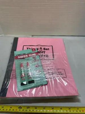 Two pack of superglue, six count notepads