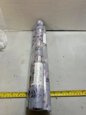 three rolls of wrapping paper