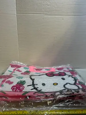 four piece clear hello Kitty tote bags