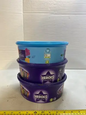 two containers of Cadbury heroes one container of Cadbury roses good Intel March 31, 2026