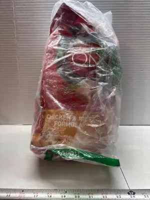 Purina one chicken and rice dog food exp:07/26 (bag slightly ripped )