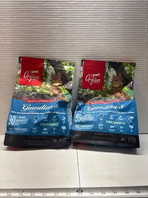 (2) 4Lb Orijen guardian 8 cat food exp:02/27