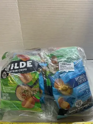 two bags of assorted flavored protein chips, good in until November 2026