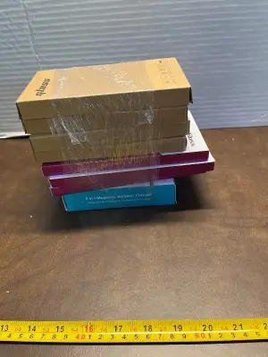 4ct cases (unknown phone size) , 3ct screen protectors, 3n1 magnetic wireless charger