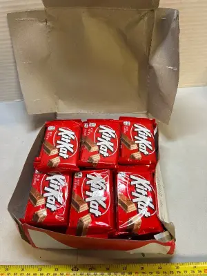 36. Pack of KitKatbars, 12/26.
