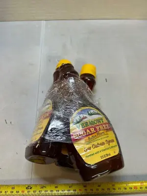 3 12 fluid ounce bottles of sugar-free butter flavor, low-calorie syrup, fortified with six vitamins and minerals one bottle missing cap buy April 2028