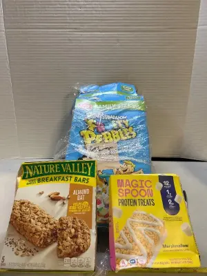 two family size boxes of fruity pebbles with marshmallows one box of nature Valley, soft baked breakfast bars, 14 pack of magic, spoon protein treats marshmallow flavor
