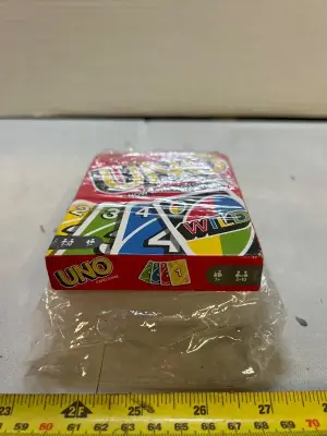 A lot of ultra clear, protecting cards, sleeves, and Uno