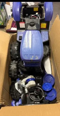 disassembled power wheel tractor used as is