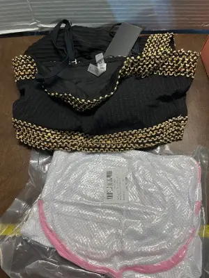 2 bags to pack laundry, med. size swim suit