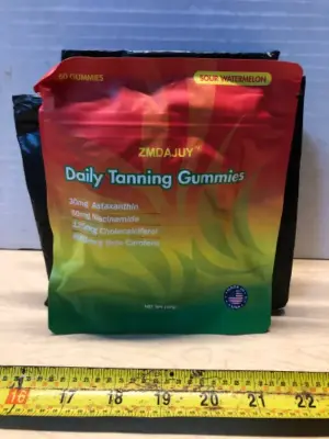 4 bags daily tanning gummies 60 gummies each bag exp:3/27