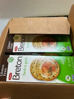 box of gluten-free herb and garlic crackers best before July 2025