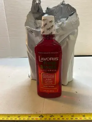 three counts 18 fluid ounce bottles of fresh breath, mouthwash, cinnamon flavored