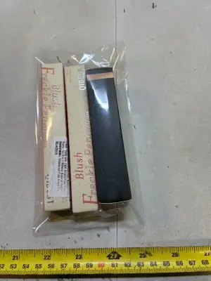 two piece freckle pen, 34 fluid ounces of eye corrector SPF 41 natural color