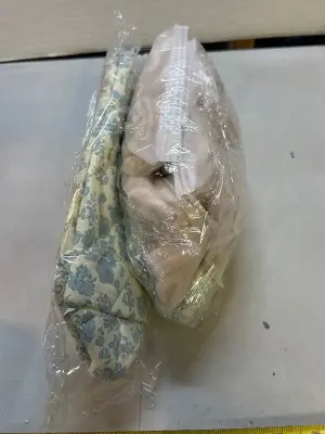 two piece floral makeup bag and lots of hair ties