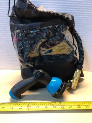 Garden hose in bag with nozzle