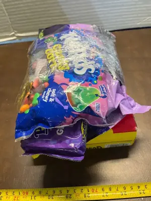 bundle of various candies & box of gushers