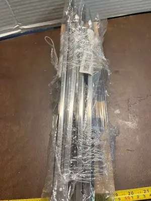 wooden kitchen utensil set & bundle of tongs