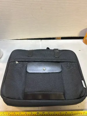 satchel with binder rings inside and over the shoulder strap